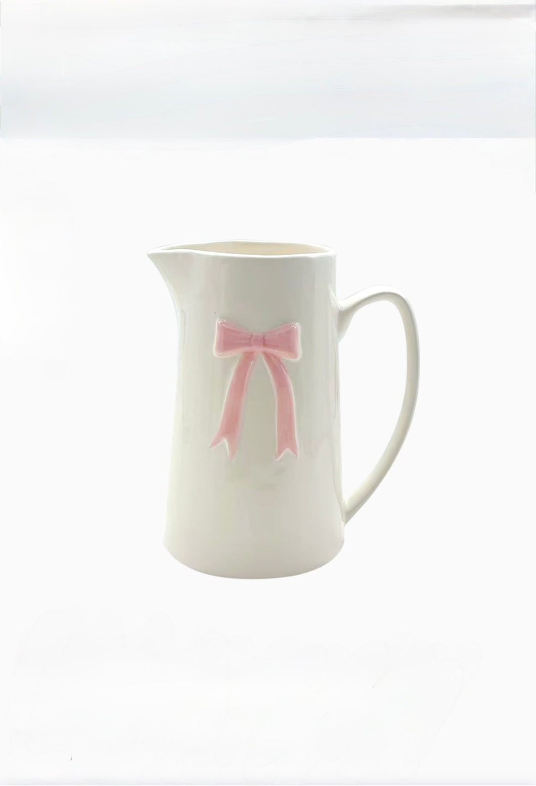 Pichet nœud gm rose L17,8 P12,5 H21,3cm